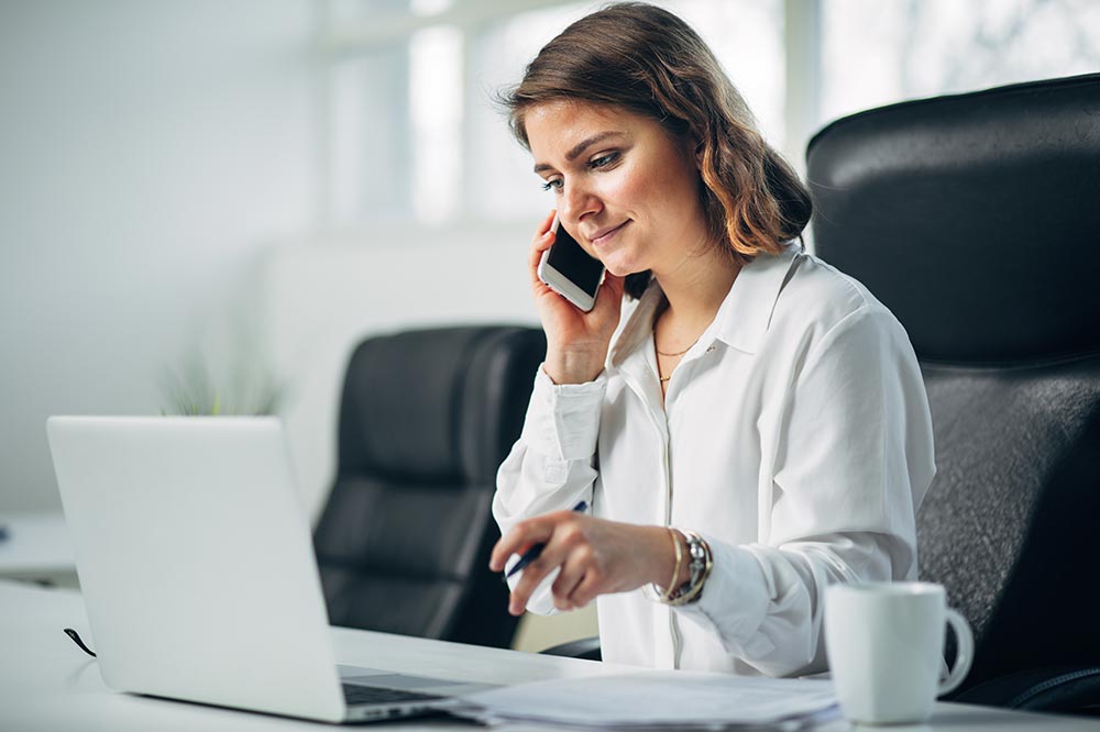 Photo of a woman on the telephone