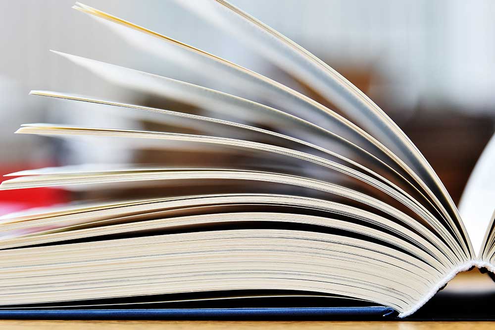 Photo of a book with the pages fanned